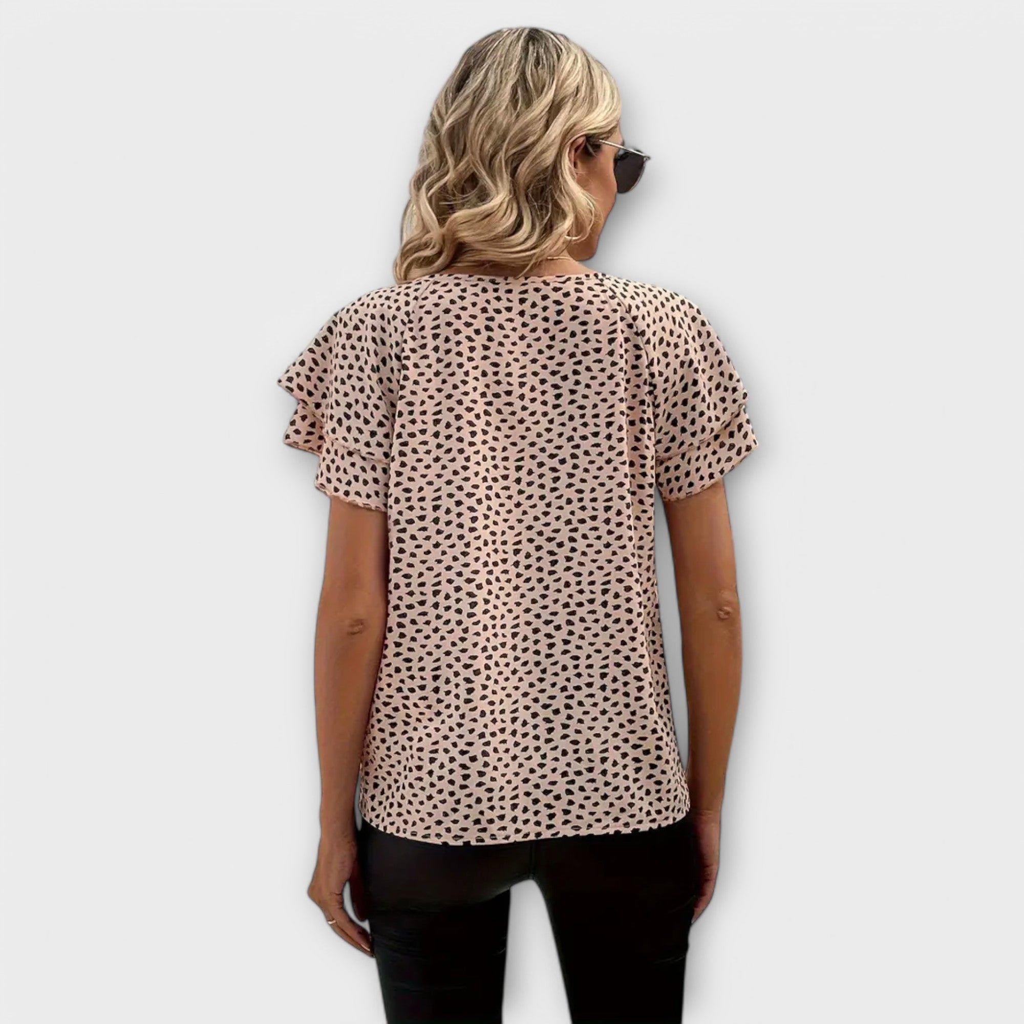Noéma | All-over print blouse with ruffled trim
